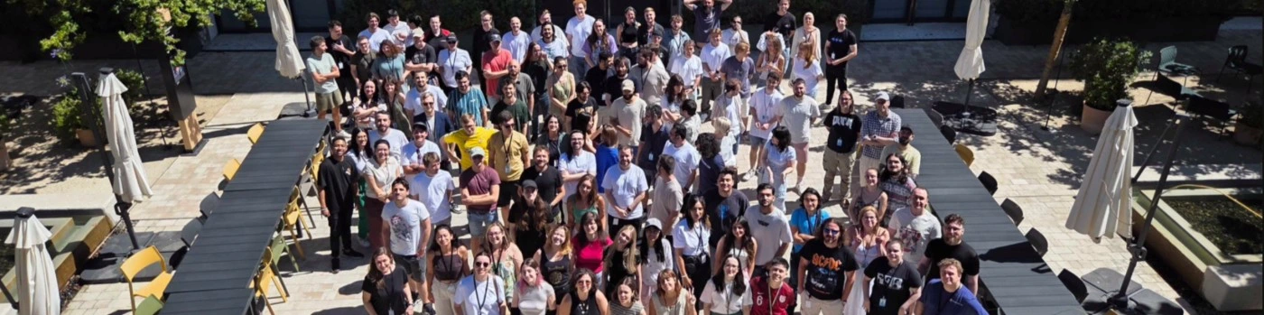 Group photograph of the full EA Sports FC26 localization team across all languages