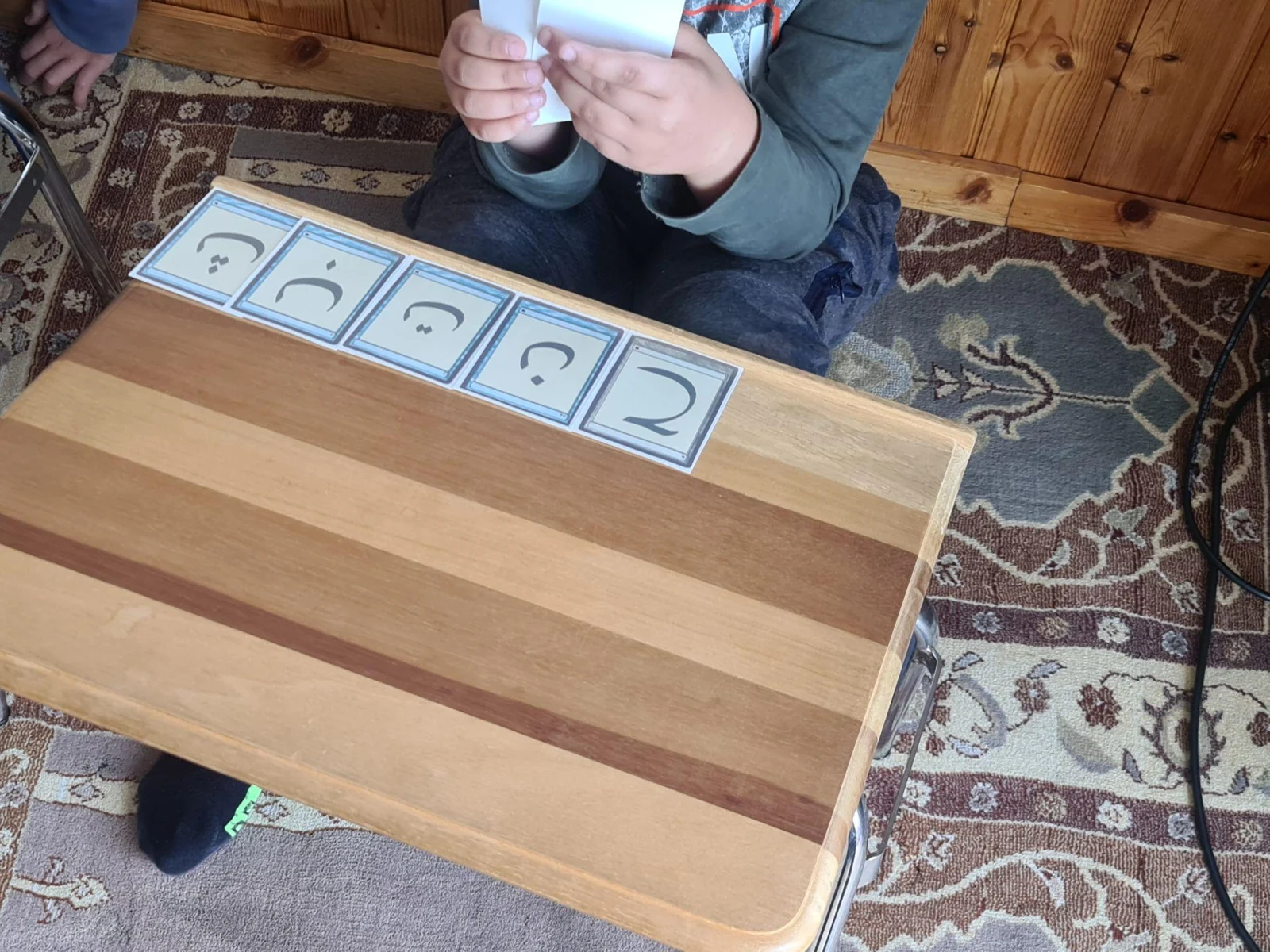 Elif Ba cards being used during a classroom test
