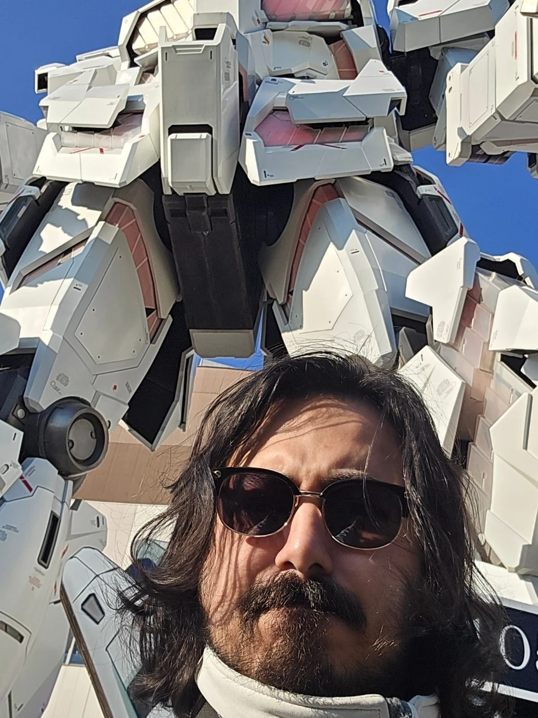 A selfie in front of the giant Gundam during my trip to Japan
